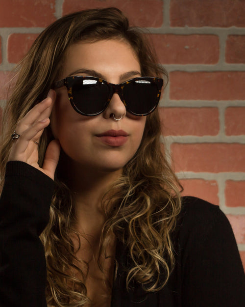 Marina del Rey Polarized Round Acetate + Wood Sunglasses worn by a customer model