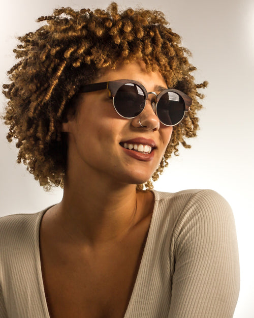 Pacific Palisades Polarized Bamboo Sunglasses worn by a customer model