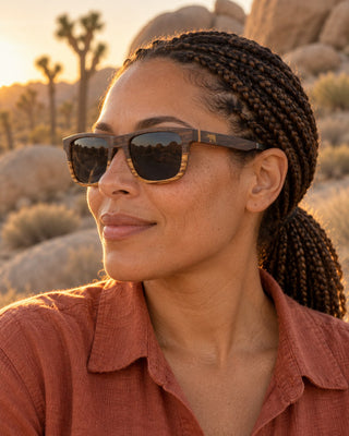 Joshua Tree polarized sunglasses worn by a woman among desert boulders in Joshua Tree National Park