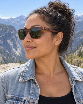 Kings Canyon polarized sunglasses worn by a woman on a granite overlook in Kings Canyon National Park