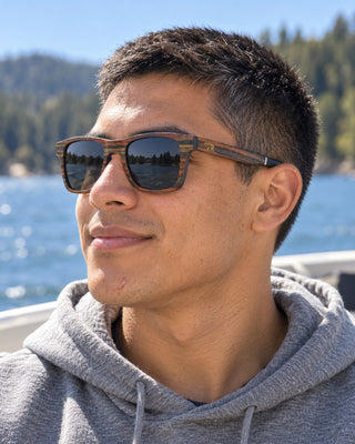 Lake Arrowhead polarized sunglasses worn by a man on a boat on Lake Arrowhead