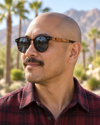 Palm Desert polarized sunglasses worn by a man on El Paseo in Palm Desert
