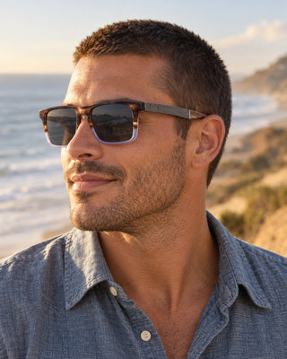 San Onofre polarized sunglasses worn by a man by the surf at San Onofre